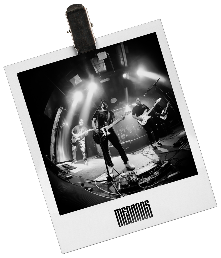 Medanos playing live on stage